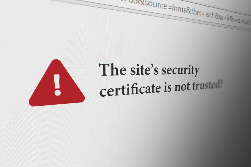 Warning message on a computer screen indicating the site's security certificate is not trusted, emphasizing the importance of SSL certificates for your website.