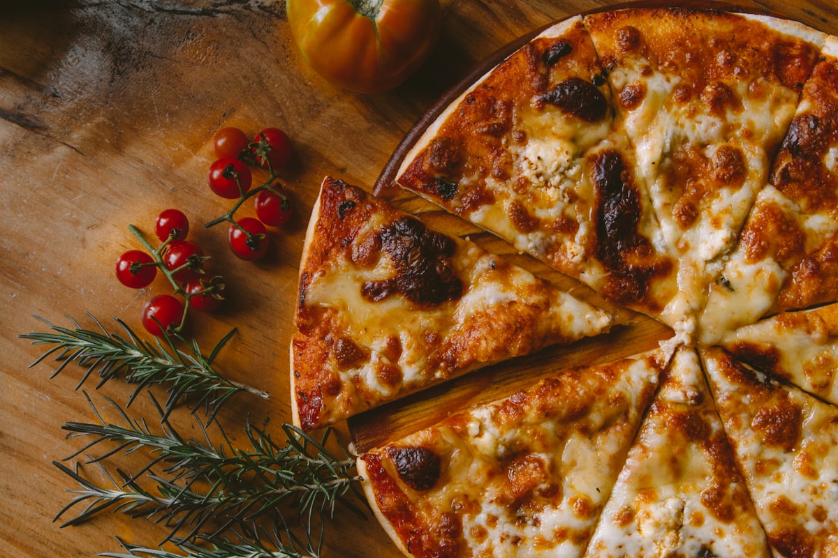 Wood-fired pizza on a pizzeria counter